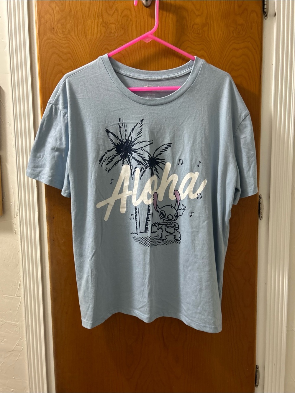 Disney Light Blue Stitch Logo T‑Shirt with Pink Accent